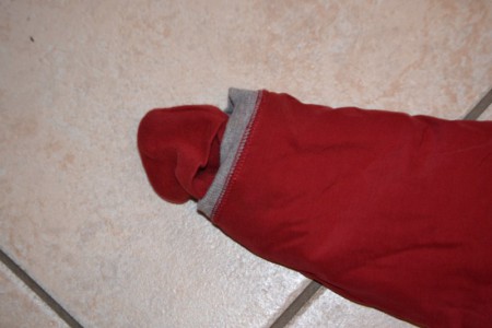 petites moufles comprises dans la combinaison 